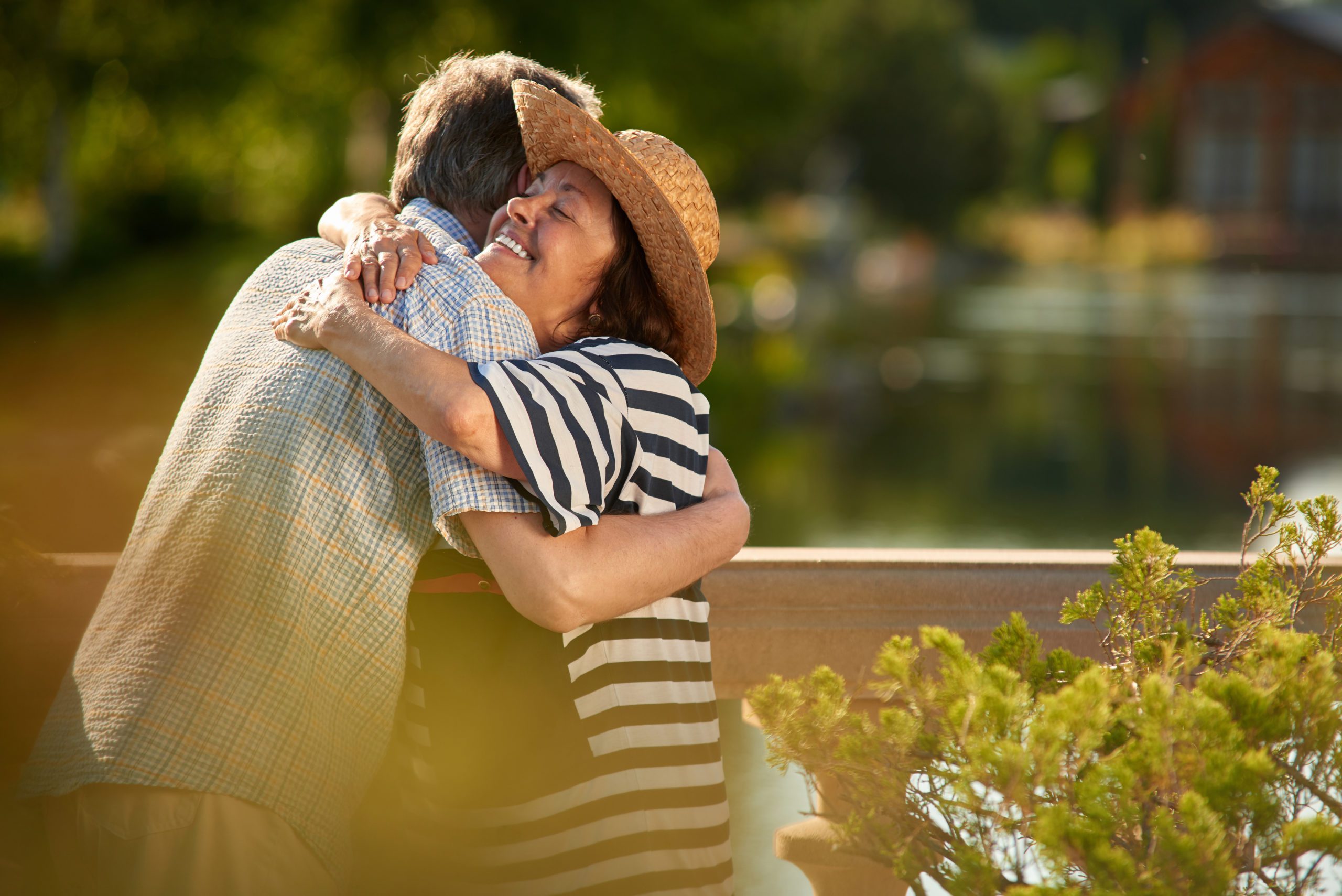 Hugging mature wife and husband. Happy loving mature couple outdoors.